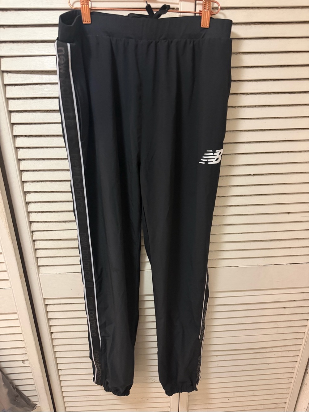 New Balance mens Black Athletic Track Pants